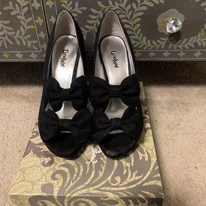 Flirty Black Suede Heels with bow detail